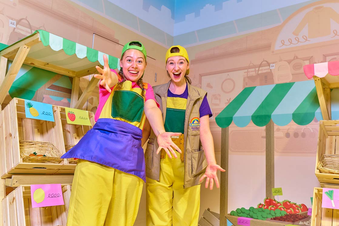 CBeebies Rainbow Adventure - Two people with outstretched arms