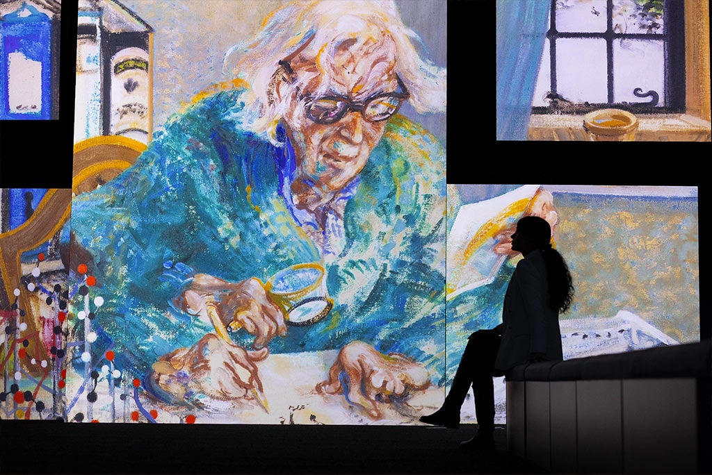 Elderly woman writing