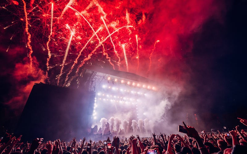 Nighttime and stage with red fireworks